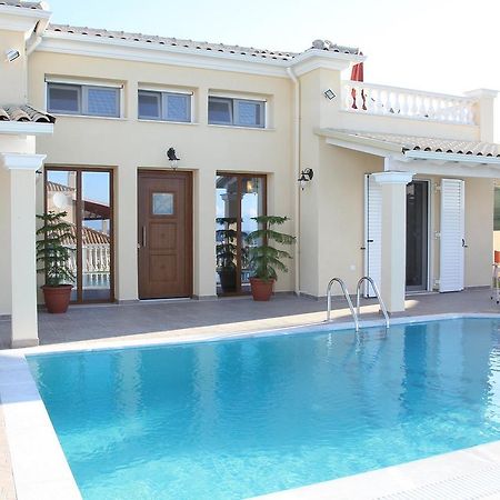 Villa De La Mer Агиос Стефанос Экстерьер фото