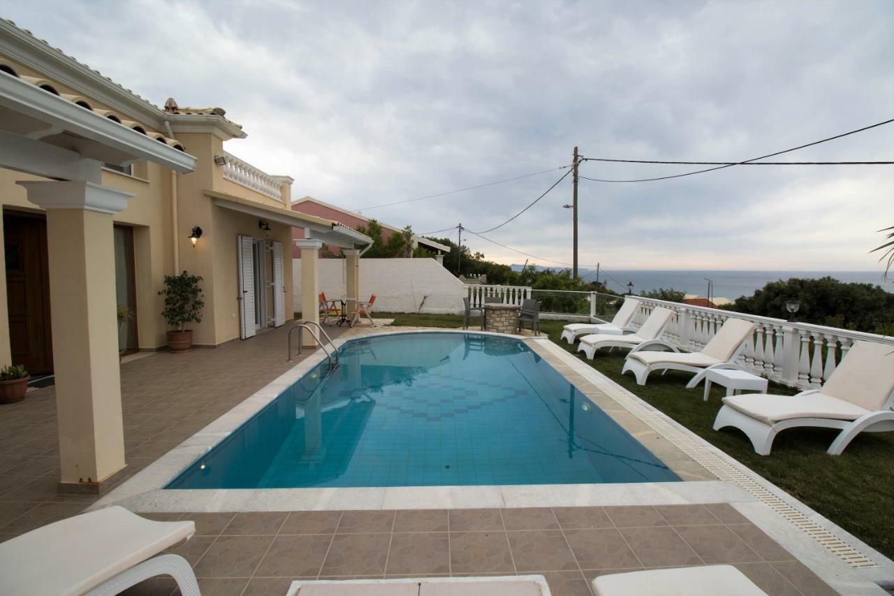 Villa De La Mer Агиос Стефанос Экстерьер фото