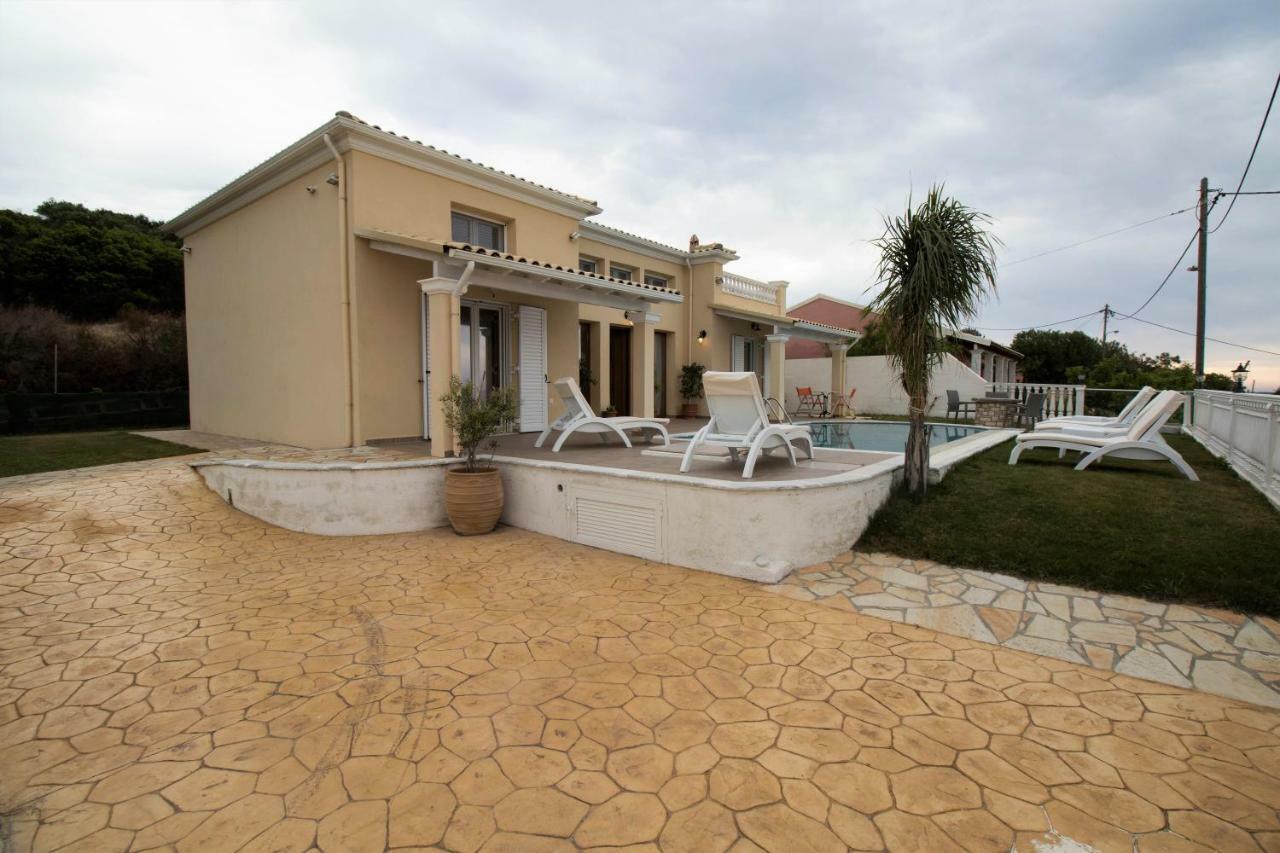 Villa De La Mer Агиос Стефанос Экстерьер фото